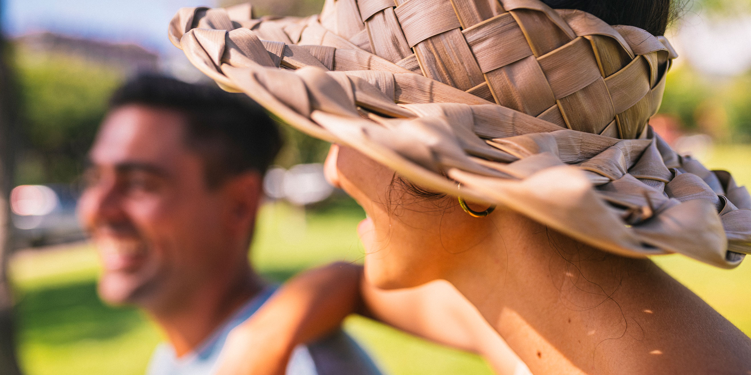 Couple with hat on outside