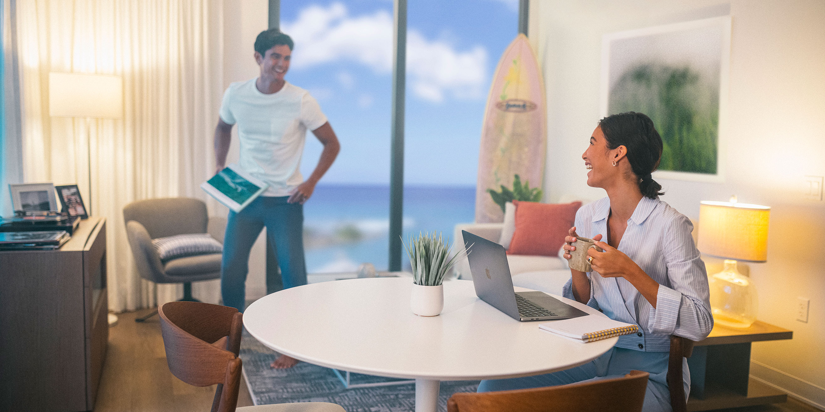 Couple inside residence laughing